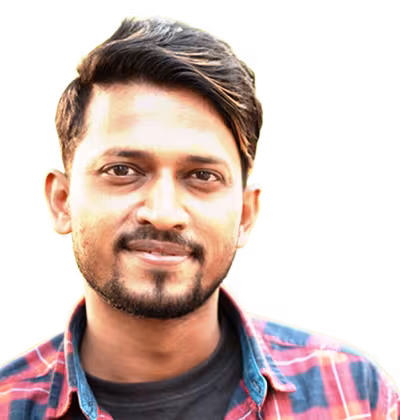 man in plaid shirt looking at camera