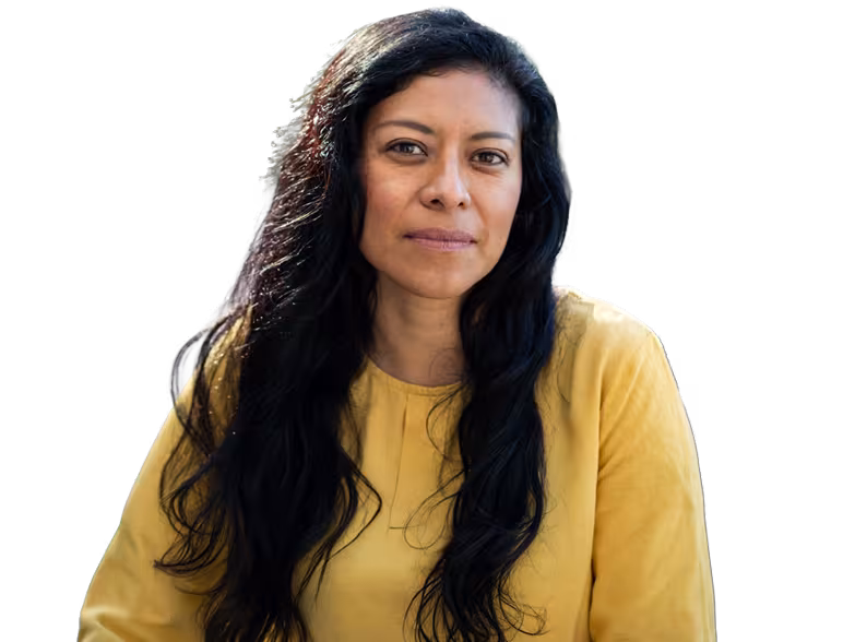 Woman with long hair looking at camera