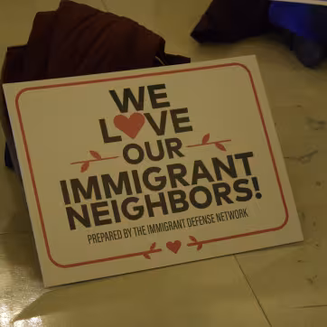 We Love Our Immigrant Neighbors sign