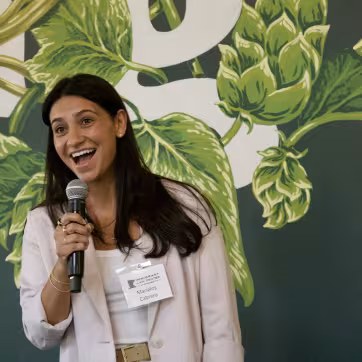 Woman speaks at event