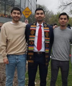 José and his two brothers at his graduation from the university of minnesota
