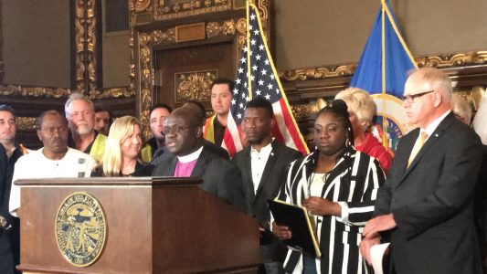 Pastor Alexander Collins speaking at press conference in January 2019 on DED extension in St. Paul Capitol building